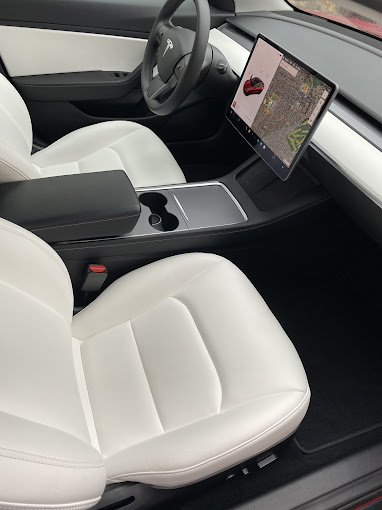 mobile auto detailing on white porsche sports car